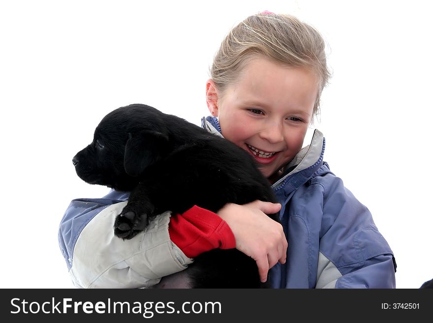 Little girl playing with her puppy. Little girl playing with her puppy