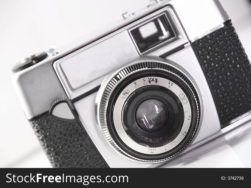 An old camera isolated on a White background