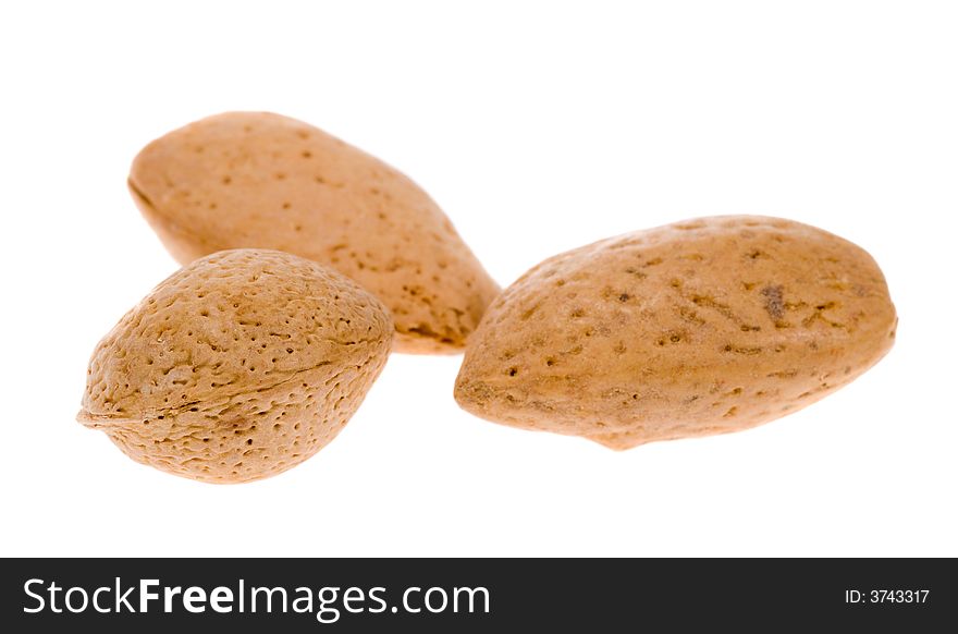 Almonds in shell isolated on a white background