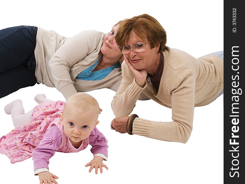 Three generation picture with a baby her mother and her great-grandma, laying on the bottom. Three generation picture with a baby her mother and her great-grandma, laying on the bottom