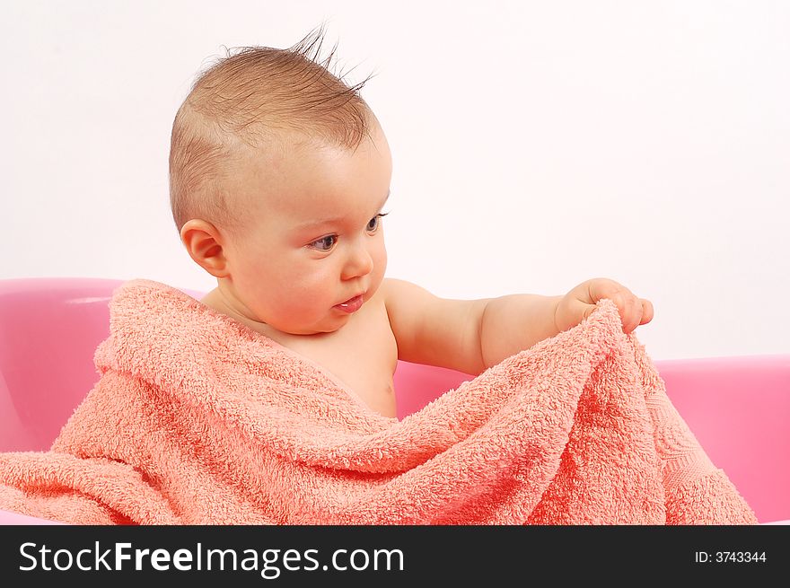 Sweet baby girl in tub on white background. Sweet baby girl in tub on white background