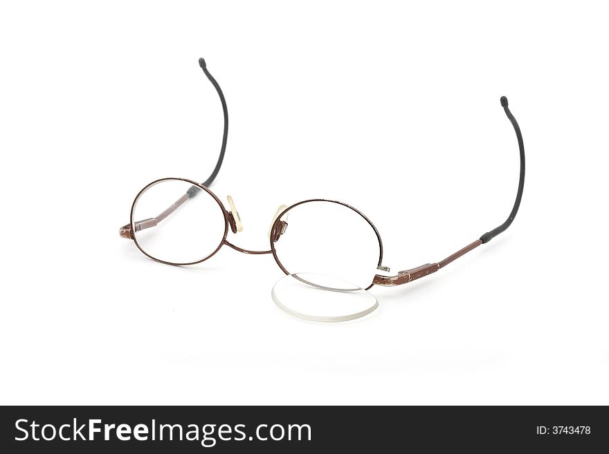 Children's broken eyeglasses isolated on white