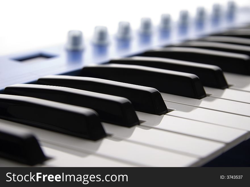 Digital photo of electronic piano with diminution of the clearness depth. Digital photo of electronic piano with diminution of the clearness depth