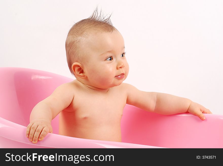 Sweet baby girl in tub on white background. Sweet baby girl in tub on white background