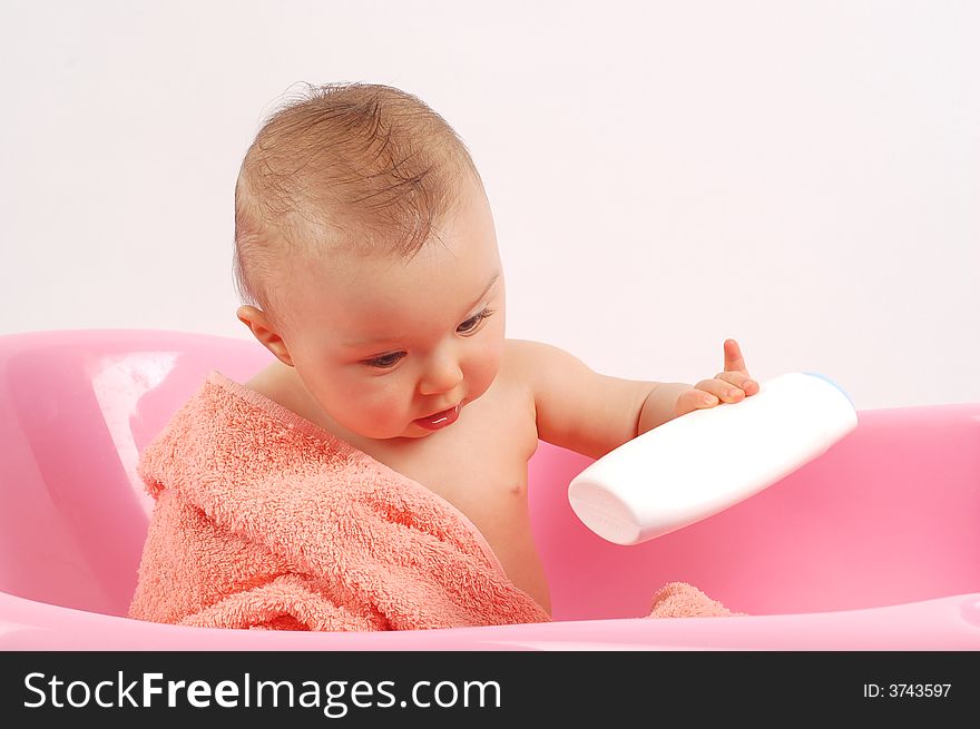 Sweet baby girl in tub on white background. Sweet baby girl in tub on white background