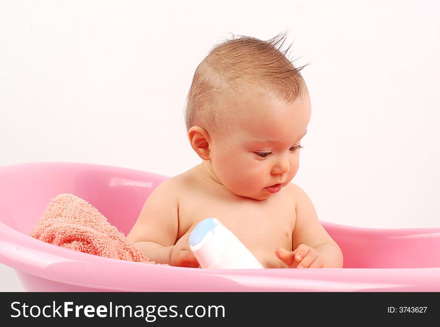 Sweet baby girl in tub on white background. Sweet baby girl in tub on white background