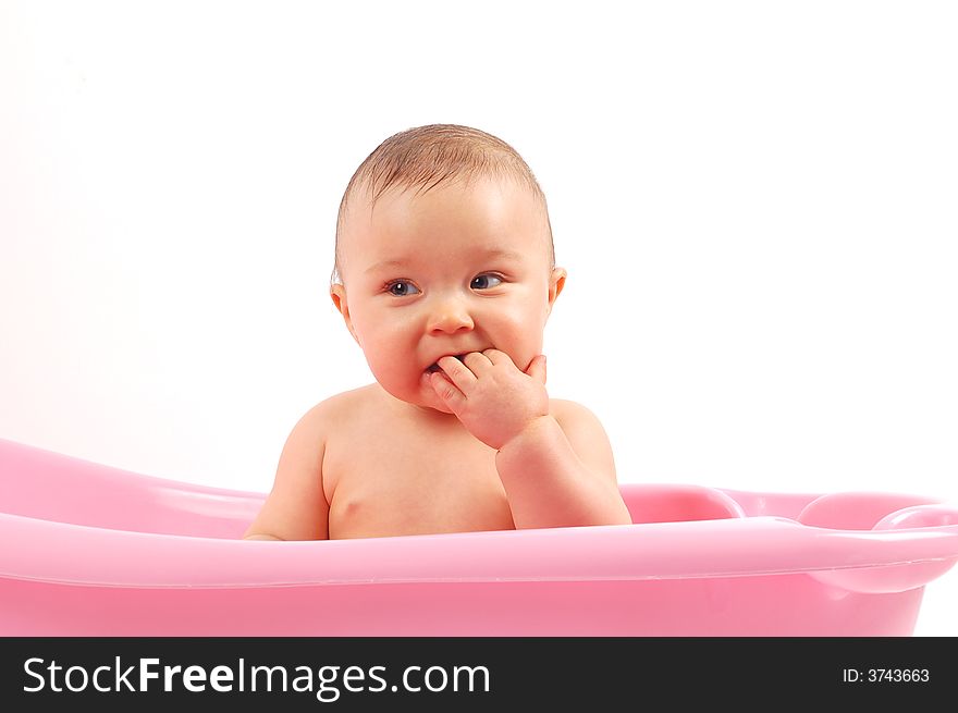 Sweet baby girl in tub on white background. Sweet baby girl in tub on white background