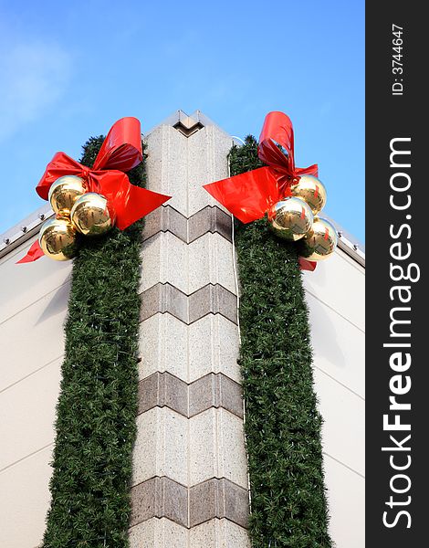 Corner of a house with a christmas decoration.