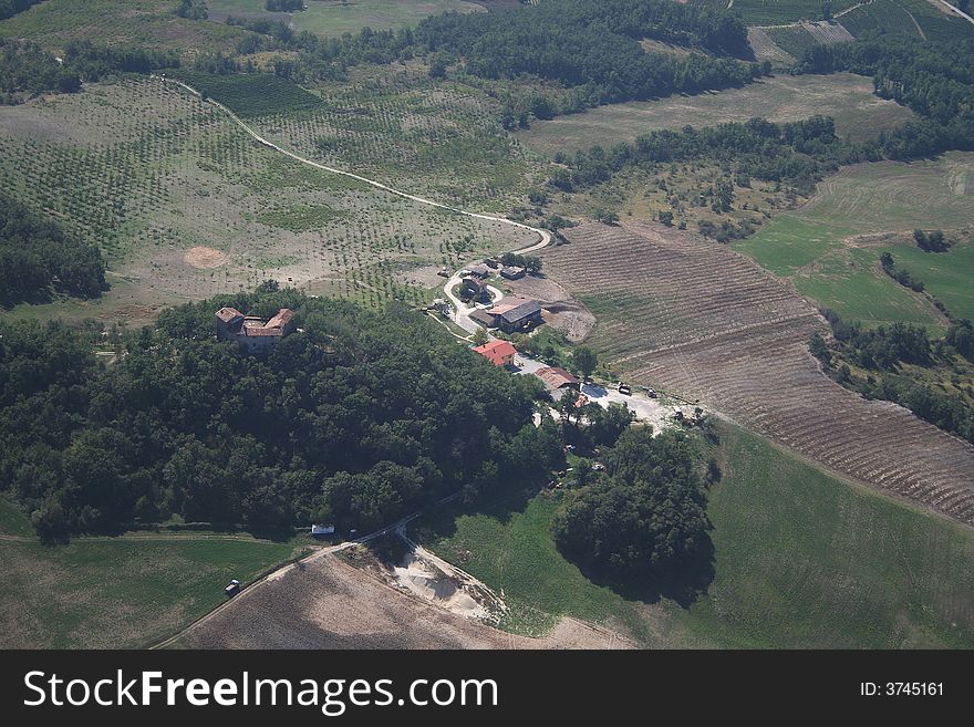 Aerial view of a farm located in the hills at east of Voghera

More info on Voghera http://en.wikipedia.org/wiki/Voghera. Aerial view of a farm located in the hills at east of Voghera

More info on Voghera http://en.wikipedia.org/wiki/Voghera