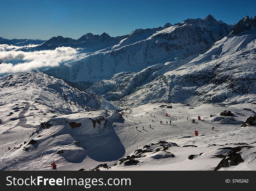 Skying in the Swiss Alps. View from Bettmerhorn ski gondola station, Bettmeralp, Brig Wallis-Valais Switzerland. Skying in the Swiss Alps. View from Bettmerhorn ski gondola station, Bettmeralp, Brig Wallis-Valais Switzerland