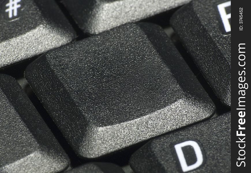 Closeup of an empty key on a keyboard