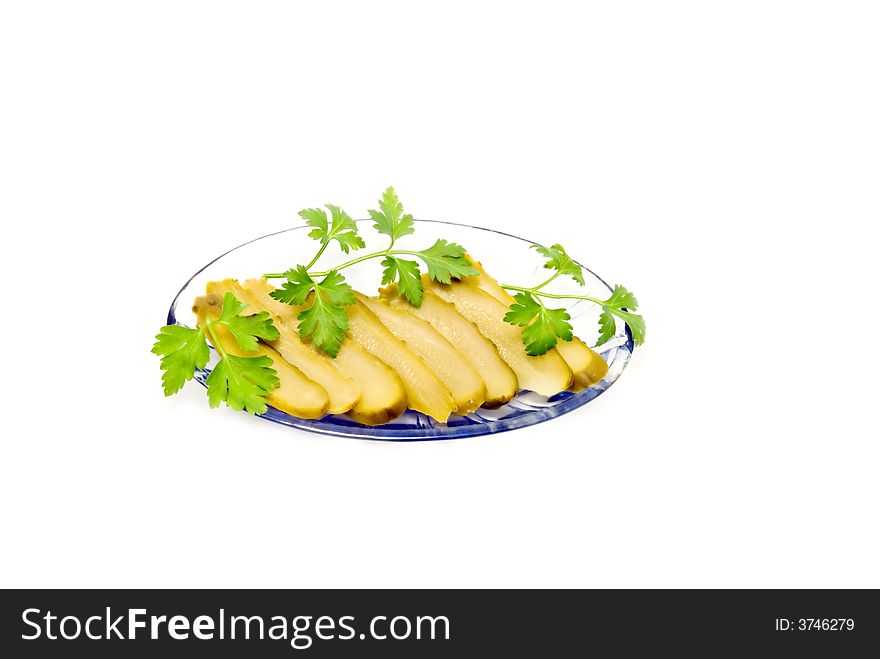 Salt cucumbers with parsley on a white background