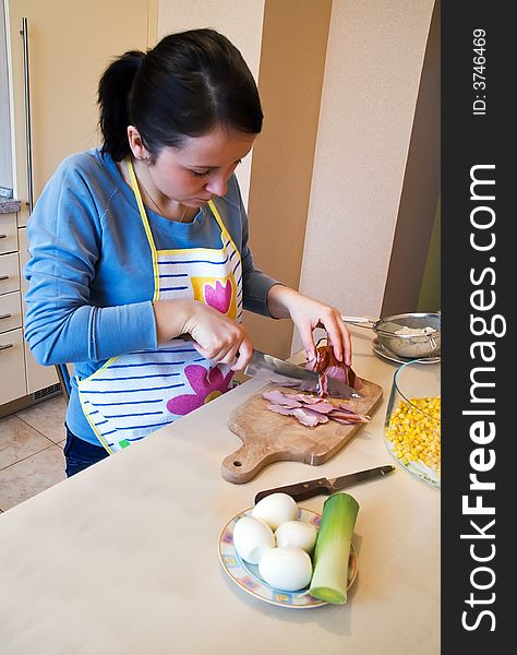 Ham peeling on kitchen desk for layer salad