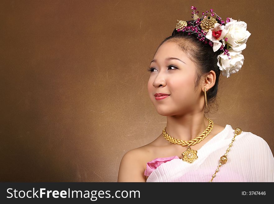 An beautiful girl in Thai costume dress. An beautiful girl in Thai costume dress