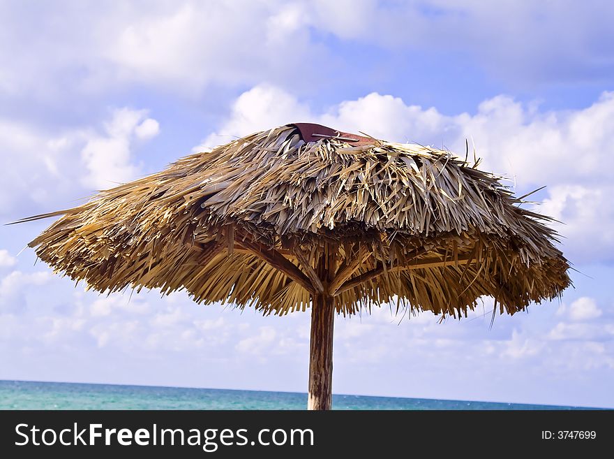 Caribbean vacation beach scene blue sky