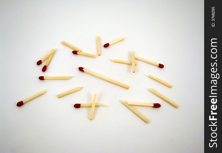 A pile of matches in various positions.