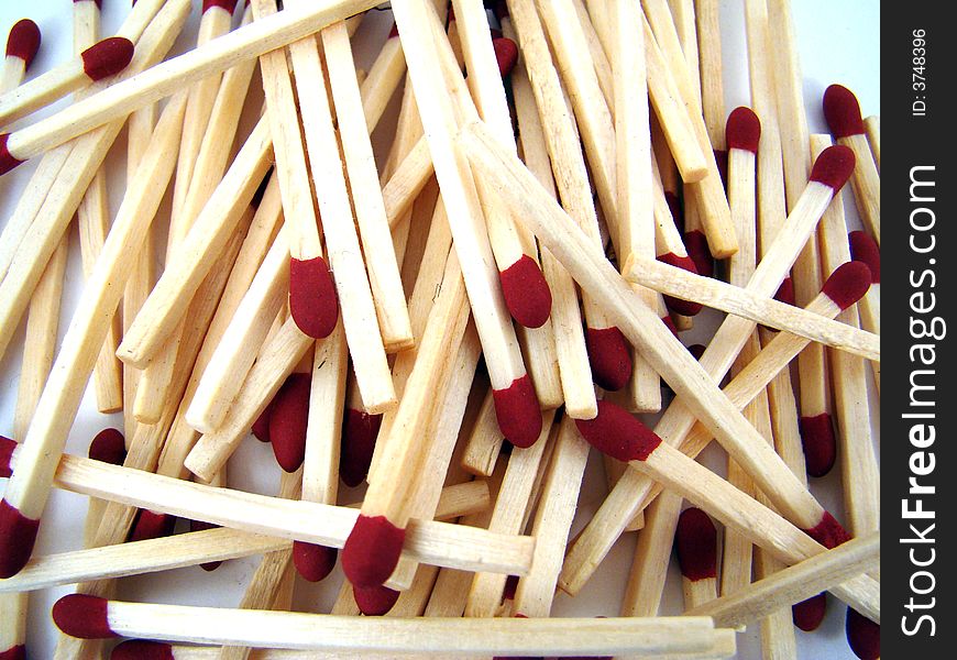 A pile of matches in various positions.
