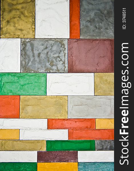 Wall with colored decorative stone. Wall with colored decorative stone