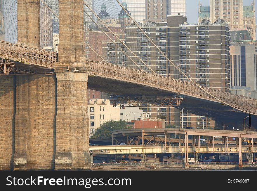 A flat view of lower Manhatten showing the brooklyn bridge, abundance of buildings & overpasses. A flat view of lower Manhatten showing the brooklyn bridge, abundance of buildings & overpasses