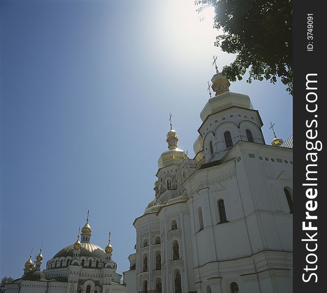 Mother of God Assumption Church on the right,The Refectory Church on the left, Pechersk Lavra monastery, Kiev, Ukraine. Mother of God Assumption Church on the right,The Refectory Church on the left, Pechersk Lavra monastery, Kiev, Ukraine