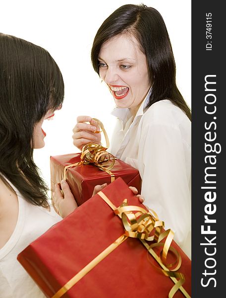 Two funny girls give gifts. Two funny girls give gifts