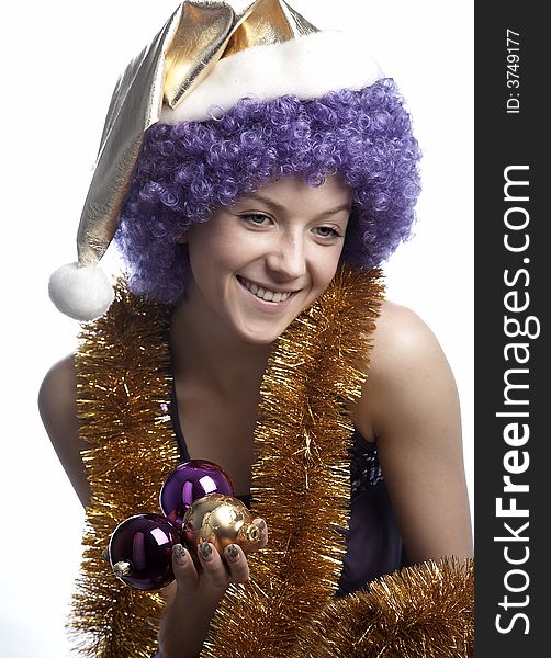 Girl in santa's hat and purple wig. Girl in santa's hat and purple wig