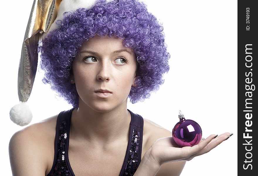 Girl in santa's hat and purple wig. Girl in santa's hat and purple wig