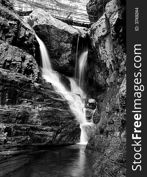 Waterfall And Rocks