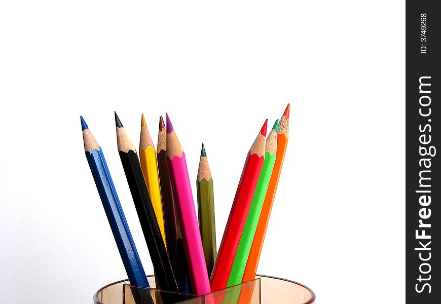 Some colorful pencils in pencil vase