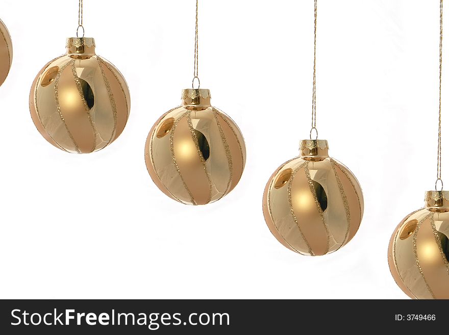 Gold Christmas Bulbs Isolated on a White Background