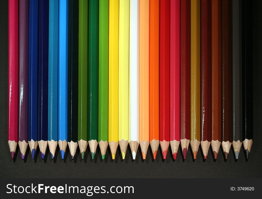 A serial of colored crayons. A serial of colored crayons
