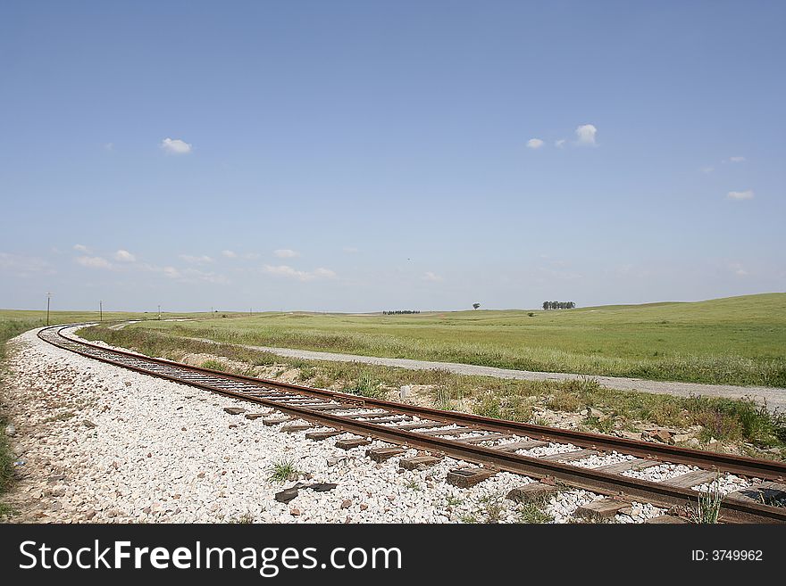 Green landscape with a railway