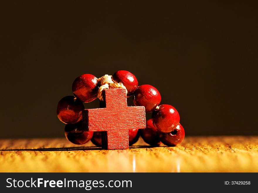 Small wooden rosary with cross