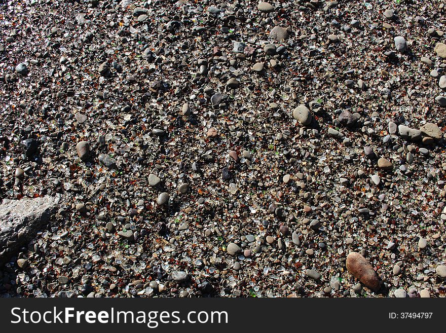 Closeup of glass sands at the Glass Beach Park at Fort Bragg, California. Closeup of glass sands at the Glass Beach Park at Fort Bragg, California.