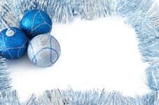 Three Christmas Baubles With Silver Tinsel Stock Photography Three Christmas Baubles With Silver Tinsel Stock Photography