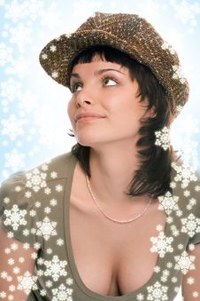 Woman In Cap With Snow Royalty Free Stock Photography