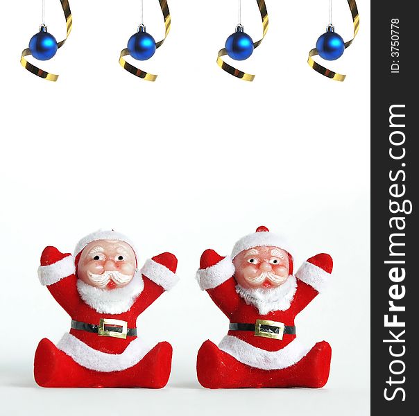 Two  Santa Claus Figurines with blue balls. Two  Santa Claus Figurines with blue balls
