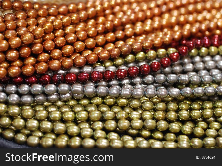 Closeup of colorful freshwater pearl strands. Closeup of colorful freshwater pearl strands