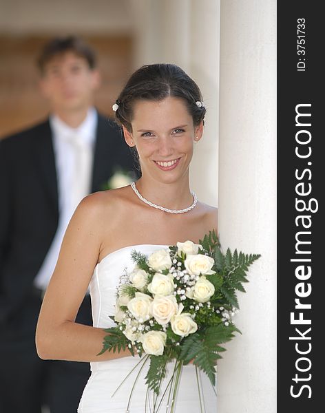 Beautiful young bride with flowers. Beautiful young bride with flowers