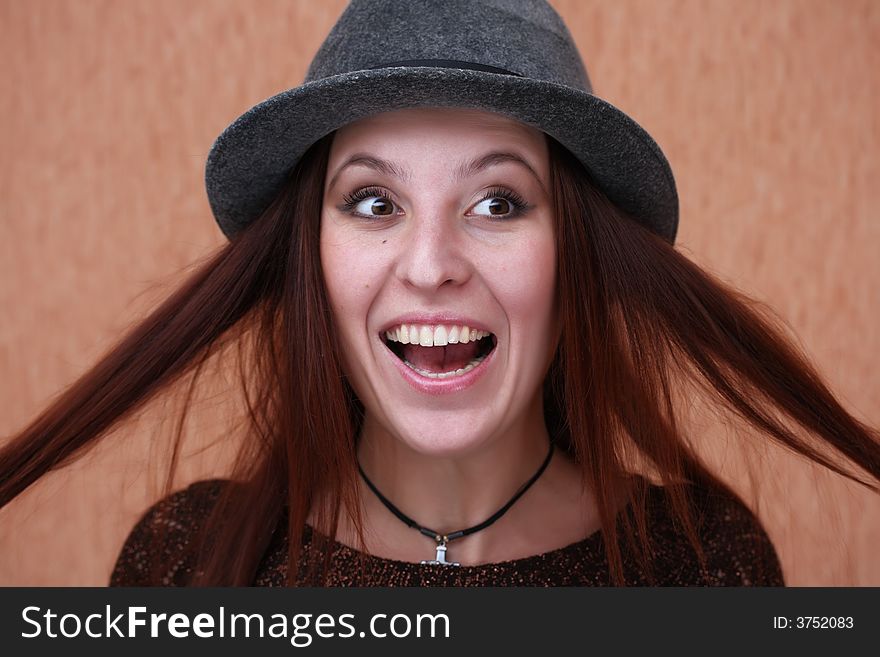 Portrait of a young woman with surprised expression. Portrait of a young woman with surprised expression