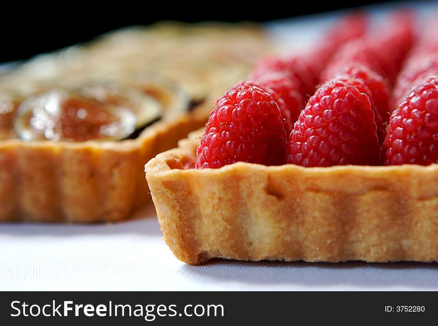 An image of fresh fruit tarts