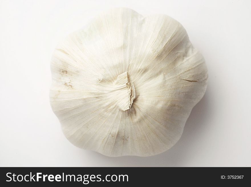 Garlic head isolated on white background