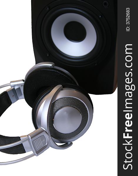 Acoustic system and headphones on a white background. Acoustic system and headphones on a white background