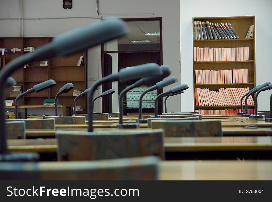 Reading room in library - shelf with old books