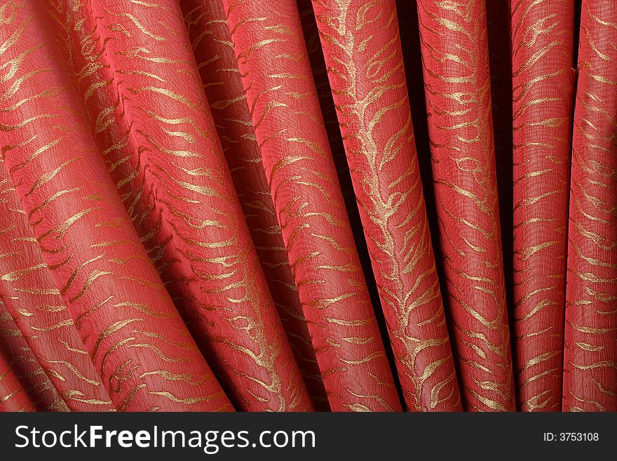 Red curtain with golden pattern