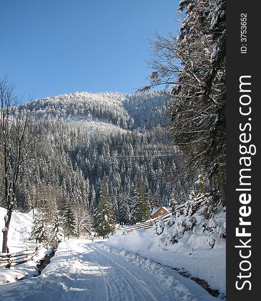 Transcarpathian winter landscape, with camper and road