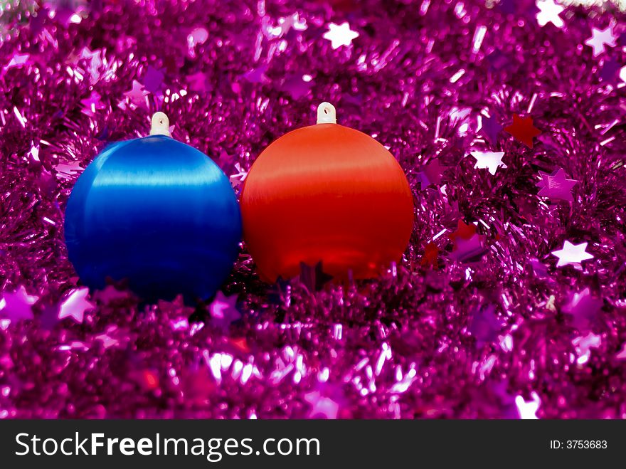 Red and Blue Christmas Ball decorations lying in garland. Red and Blue Christmas Ball decorations lying in garland