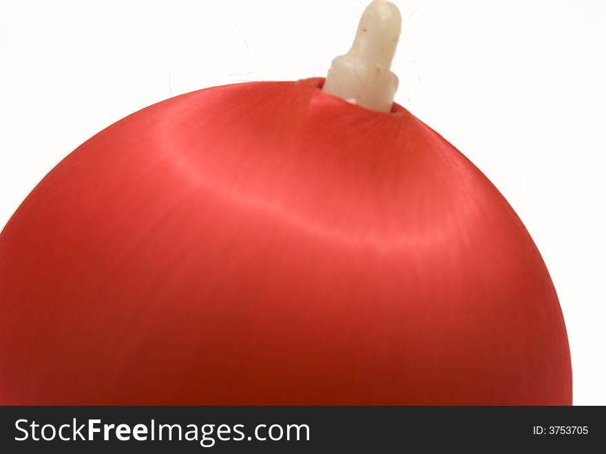 Macro view of a Christmas Ball Ornament isolated against a white background. Macro view of a Christmas Ball Ornament isolated against a white background