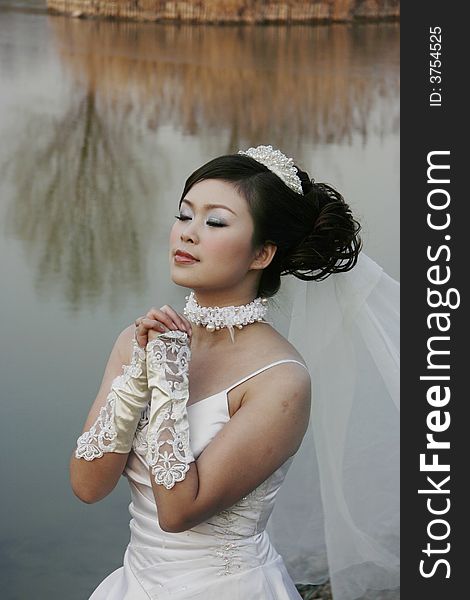 A chinese girl in wedding dress. A chinese girl in wedding dress
