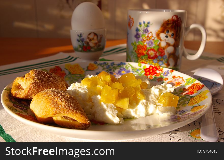 Kiddy breakfast, cottage cheese with jam, milk and cookies